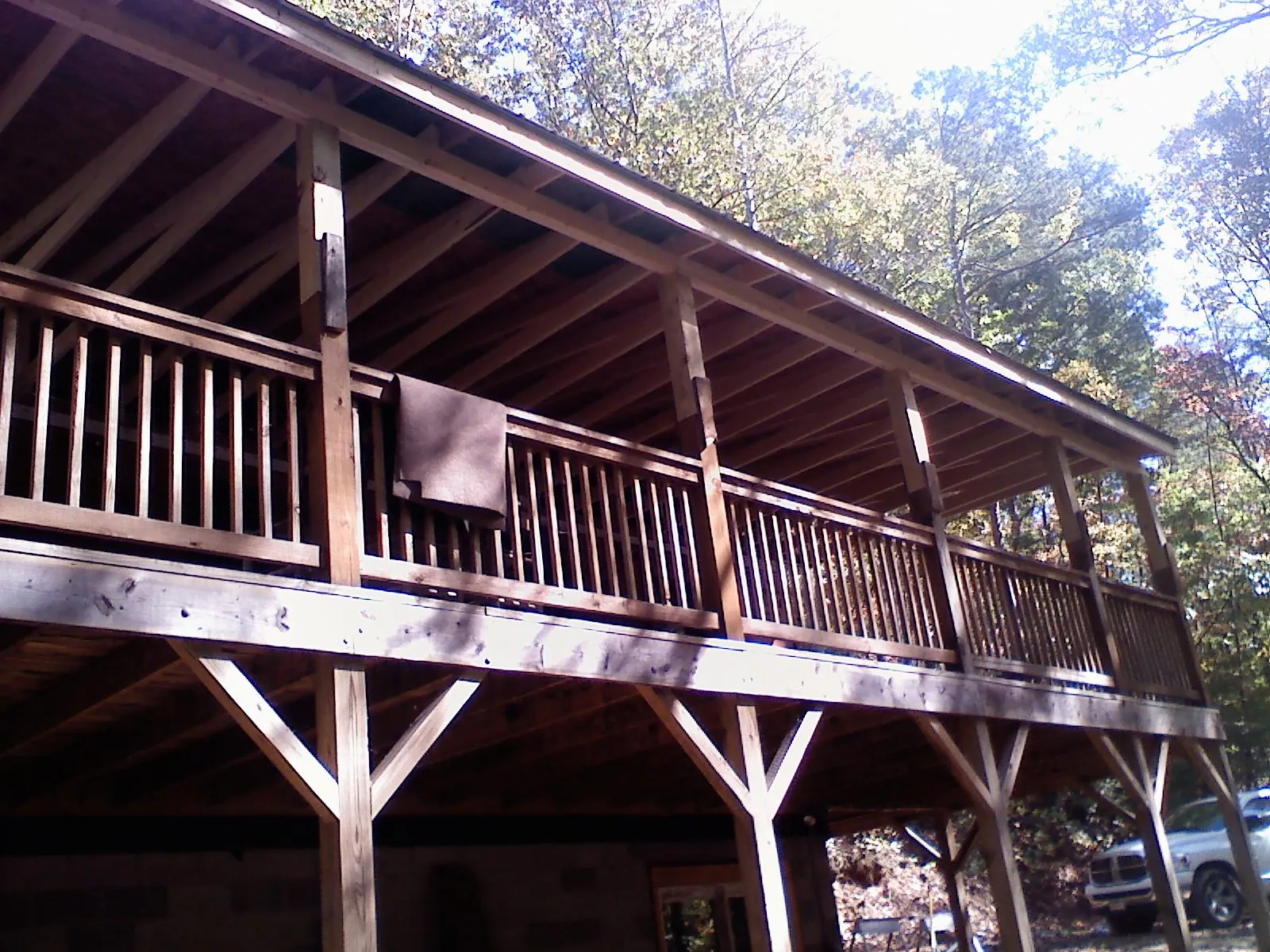 Timber framing under a new elevated porch and deck — Roof Leak Repair in Deposit by Roofing Brothers